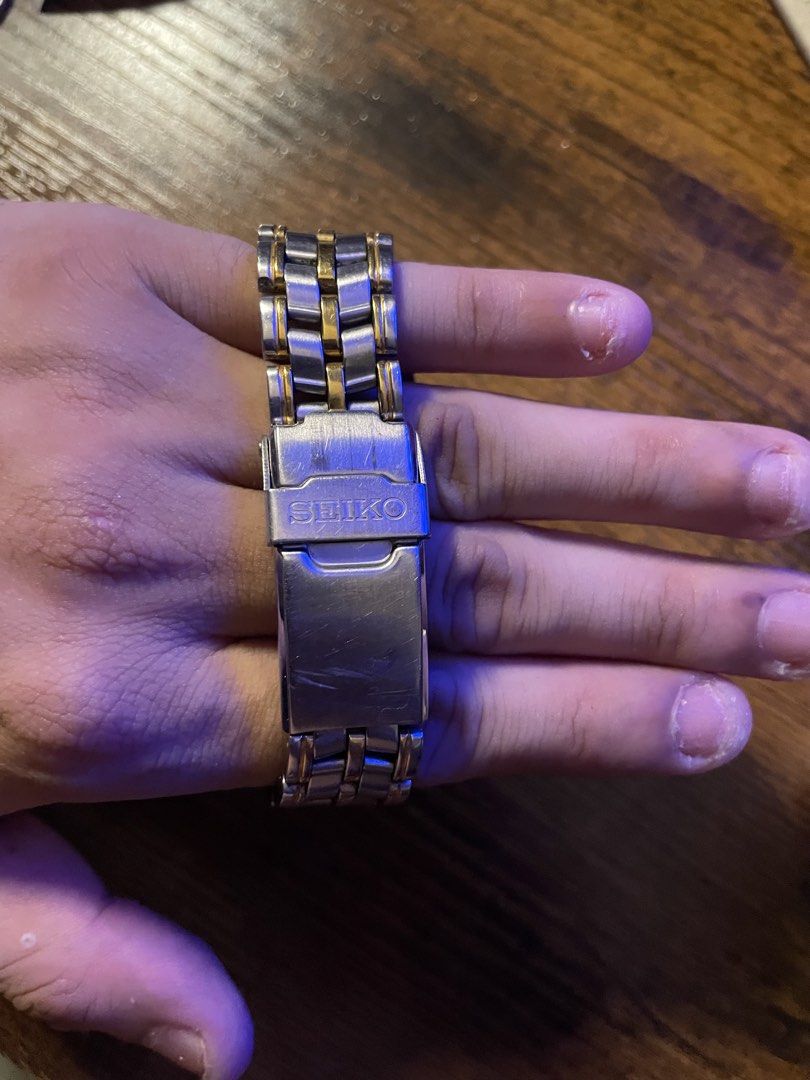 Seiko Kinetic SQ 50 Watch (Category: Men's Watches) located in Quezon City. Submitted by saintino0o (Listing ID 1462219166, Image 2). Description: PRICE IS NEGOTIABLE - Seiko Kinetic watch - Two-tone stainless steel band - White dial with day and date display - Water resistant 5 BAR - Durable sapphire crystal - Secure clasp .