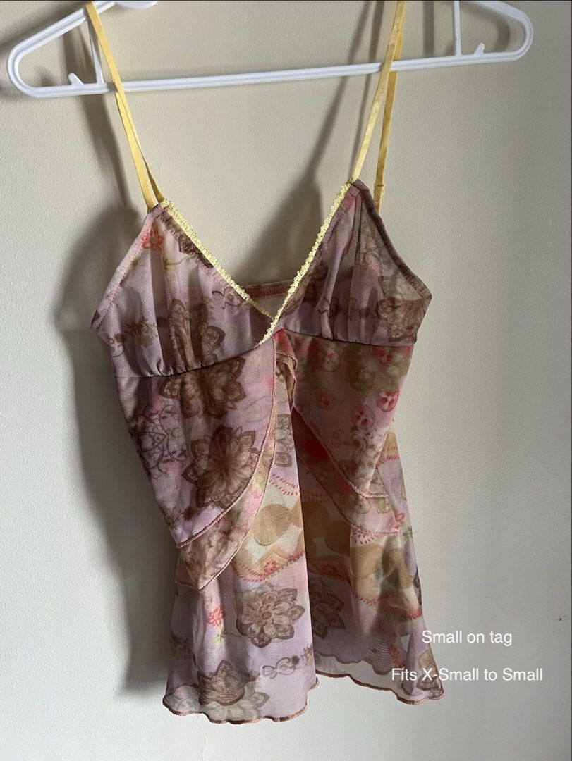 Sheer Floral Cami Top - Size Small (Category: Sleeveless) located in Manila. Submitted by francinemanaois (Listing ID 1462072301, Image 1). Description: Cute sheer cami top with a floral print. It has yellow ribbon straps and trim. The fabric is lightweight and flowy. Looks great layered or on its own. Fits like an XS to Small. Great for a Y2K or cottagecore vibe..