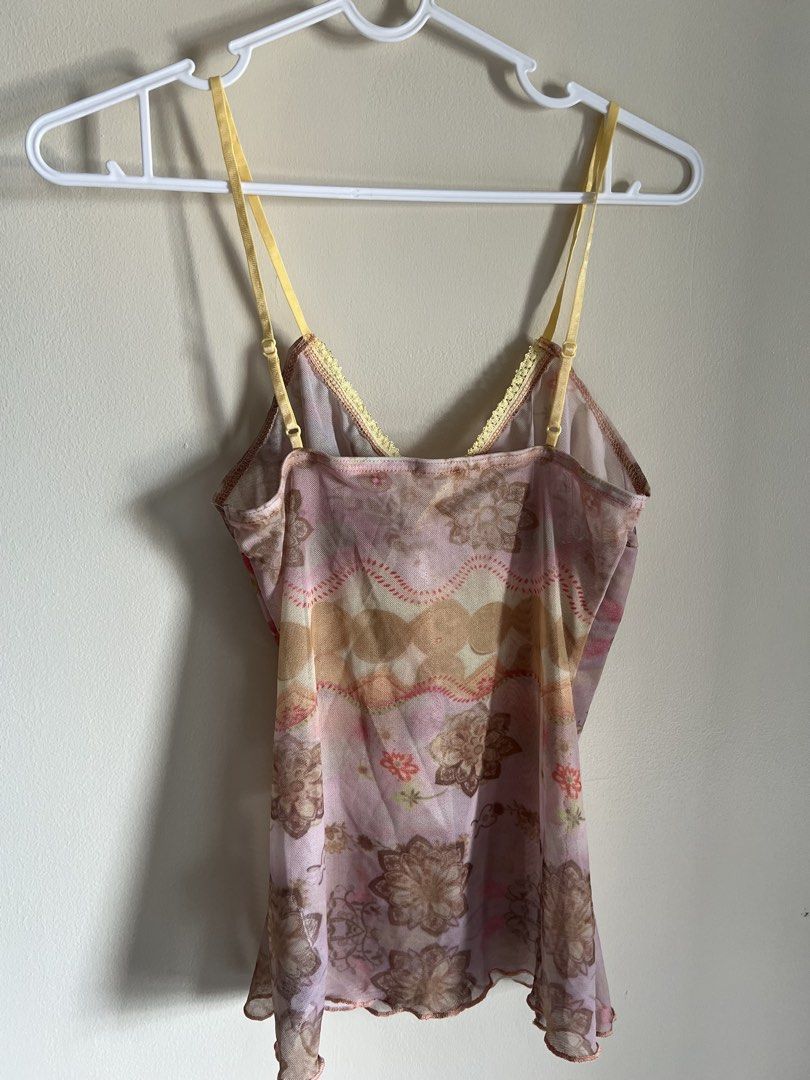 Sheer Floral Cami Top - Size Small (Category: Sleeveless) located in Manila. Submitted by francinemanaois (Listing ID 1462072301, Image 2). Description: Cute sheer cami top with a floral print. It has yellow ribbon straps and trim. The fabric is lightweight and flowy. Looks great layered or on its own. Fits like an XS to Small. Great for a Y2K or cottagecore vibe..
