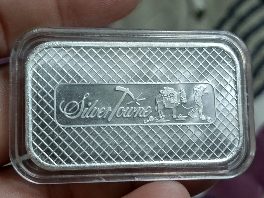 SilverTowne 1 oz Fine Silver Bars (10oz Available) (Category: Currency) located in Quezon City. Submitted by Coiners (Listing ID 1462213587, Image 2). Description: 5500 each - Lot of 10 SilverTowne 1 oz fine silver bars - Each bar is.999 pure silver - Features both eagle and mining scene designs - All bars come in protective plastic cases - Ideal for coin collectors and silver investors - Feel free to ask any questions!.