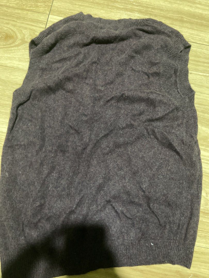 Simple Life V-neck Cable Knit Sweater Vest Medium (Category: Vests) located in Pasig City. Submitted by cielow (Listing ID 1462181880, Image 2). Description: - Brand: Simple Life - Style: V-neck sweater vest - Detail: Cable knit - Sleeveless design - Color: Dark purple - Size: Medium - Perfect for layering over shirts.