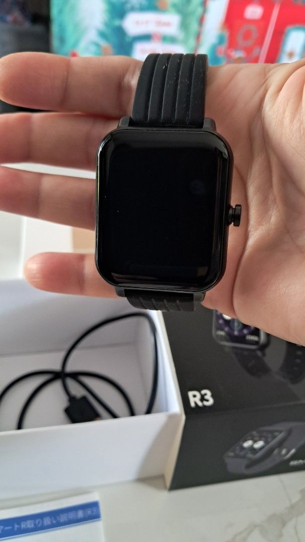 SMART R R3 Smartwatch Black (Category: Wearables & Smart Watches) located in Santa Rosa. Submitted by majanice (Listing ID 1462090521, Image 2). Description: - Smart R R3 Smartwatch - Color: Black - Display: Square - Strap: Silicone with metal buckle - Features: Health and activity tracking - Includes: Original box and charging cable bought in Japan brand new complete with box.