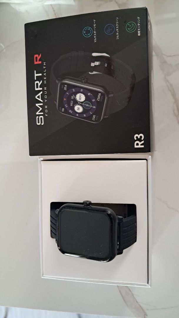 SMART R R3 Smartwatch Black (Category: Wearables & Smart Watches) located in Santa Rosa. Submitted by majanice (Listing ID 1462090521, Image 3). Description: - Smart R R3 Smartwatch - Color: Black - Display: Square - Strap: Silicone with metal buckle - Features: Health and activity tracking - Includes: Original box and charging cable bought in Japan brand new complete with box.