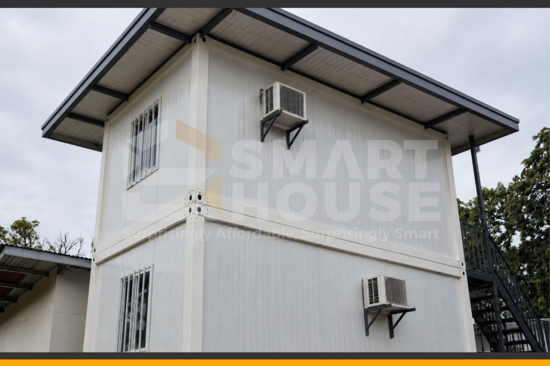 SMARTHOUSE 2 STOREY RESIDENTIAL PREFAB CONTAINER HOUSE (Category: Construction & Building Materials) located in Quezon City. Submitted by Smarthouseph (Listing ID 1462068180, Image 3). Description: LEVEL UP YOUR LIVING EXPERIENCE 💛 Hindi na uso ang luma at ordinaryong design. Sa Smarthouse : - Modern & Elegant Design - Built Strong for Long-Term Living - Fast Installation Without Compromising Quality - Fully Customizable to Your Needs Welcome to