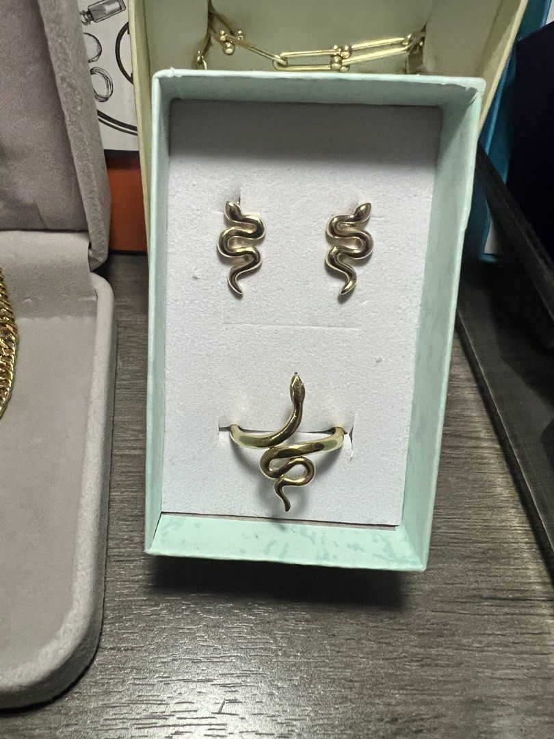 Snake ring and earing (Category: Rings) located in Cabuyao City. Submitted by kendraem (Listing ID 1462109845, Image 1). Description: Investments you can wear ✨ 18 k gold Snake ring size 8 18k Snake earring Approx wt. 4.2 total Snake - wisdom, intuition and growing health! .