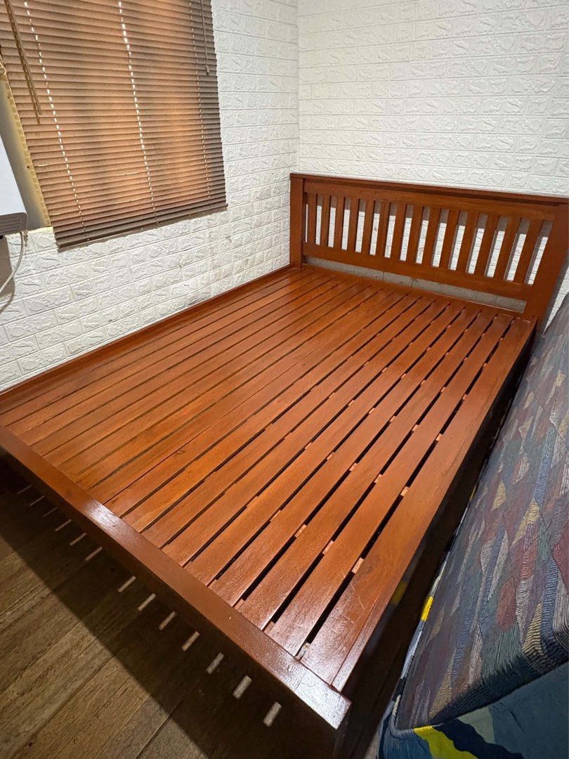 Solid Mahogany King Size Bed Frame - Move Out Sale (Category: Bed Frames & Mattresses) located in Quezon City. Submitted by zealfox-17 (Listing ID 1462072592, Image 3). Description: - Solid Mahogany King Size Bed Frame - Dimensions: 80" (L) x 60" (W) x 18" (H) - Easy to Assemble - High-Quality Furniture - Ideal for New Bedroom Setups - Price: Php 16,500 - Limited Time Offer!.