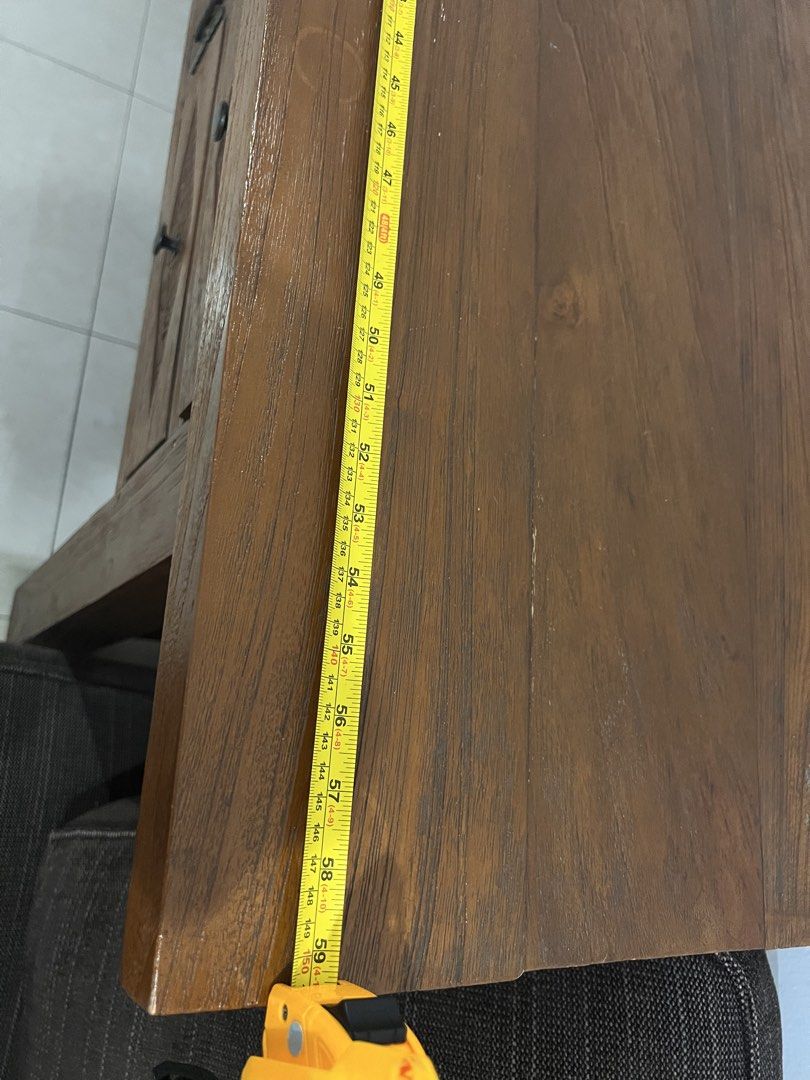 Solid Wood Console Table (Category: Shelves, Cabinets & Racks) located in Ujong Pasir. Submitted by zenjanice (Listing ID 1462180102, Image 2). Description: Selling a solid wood console table, beautifully crafted with a rustic heritage style. • Solid wood, heavy and sturdy • Strong, stable construction • Beautiful carved details on the drawers and cabinet doors • 4 drawers + 1 centre cabinet • Good storage space • Good condition, well maintained 