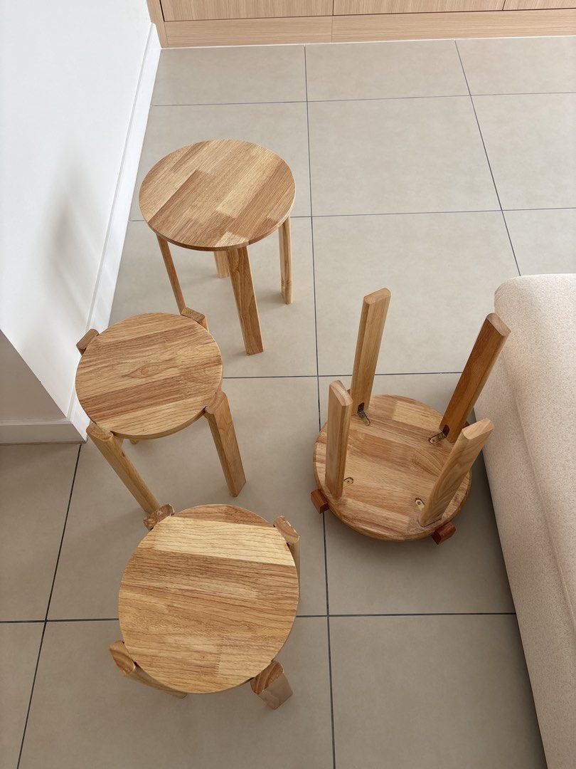 Solid Wood Round Stackable Stool with 3 Stools (Category: Tables & Sets) located in Kuala Lumpur. Submitted by funnychicken9821 (Listing ID 1462077512, Image 2). Description: - Set includes 4 solid wood round stools with wheels - Comes with 4 matching solid wood round stools - Natural wood finish - Sturdy and durable construction - Ideal for living room use or as convenient extra seating NOTE: 4 original stools but 1 stool has a broken leg .