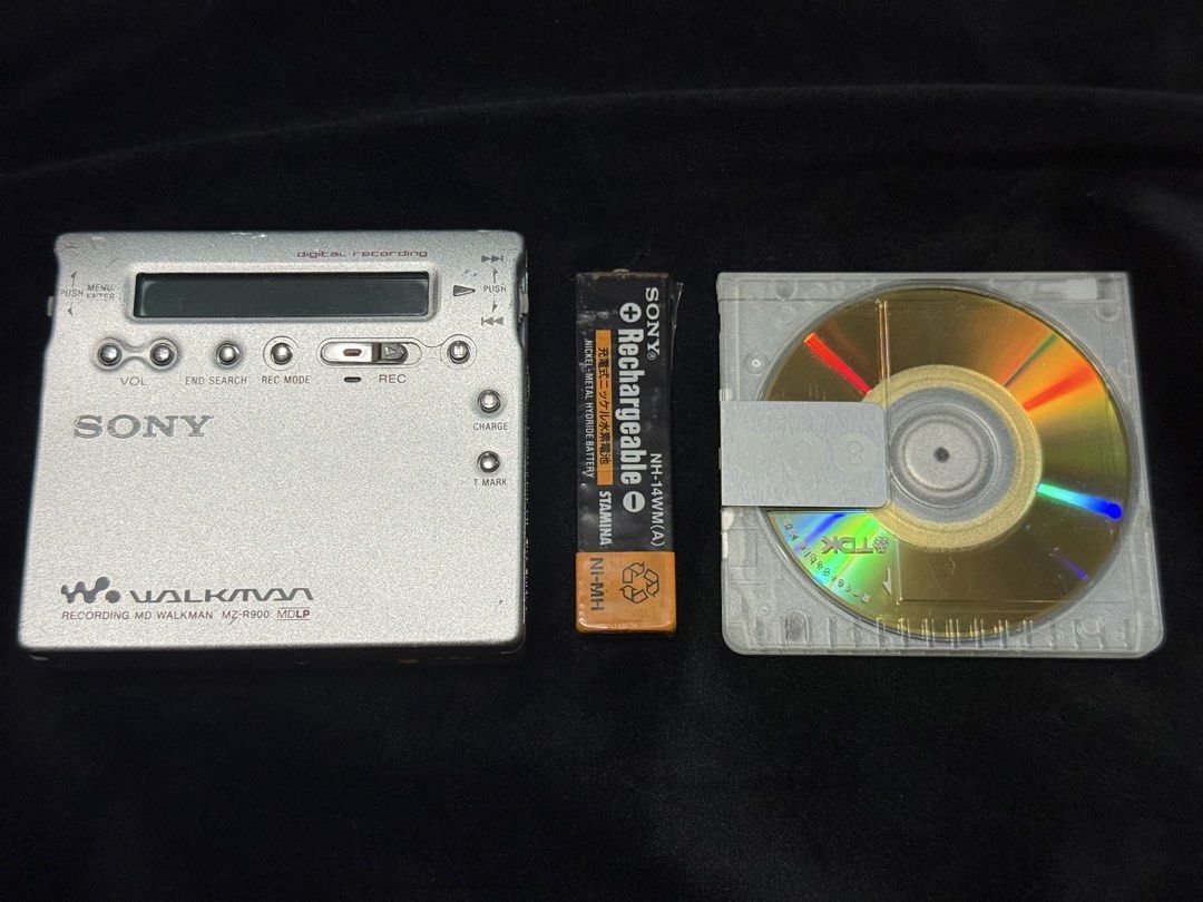 Sony MiniDisc Recorder MZ-R900 (Category: Portable Music Players) located in Makati City. Submitted by see5o5 (Listing ID 1462052248, Image 1). Description: Sony R900 MD Walkman Recorder Plays and records fine, gears have been cleaned and lubricated. The LCD has darkened over time but is still readable. This unit also has had the ribbon cable of the write head repaired. Original battery included for collection purposes but it should be replaced s