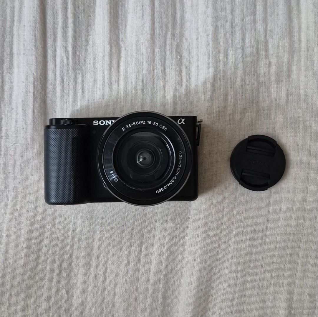 Sony ZV-E10 Mirrorless Camera with 16-50mm Lens (Category: Cameras) located in Quezon City. Submitted by livesunlit (Listing ID 1462111079, Image 2). Description: - Sony ZV-E10 Camera Body - Includes 16-50mm Power Zoom Lens - Comes with 2 Batteries - Includes Charger - Strap included - Lens cap included - screen protector on LCD included - Ideal for Vlogging & Content Creation - Ready to shoot out of the box!.