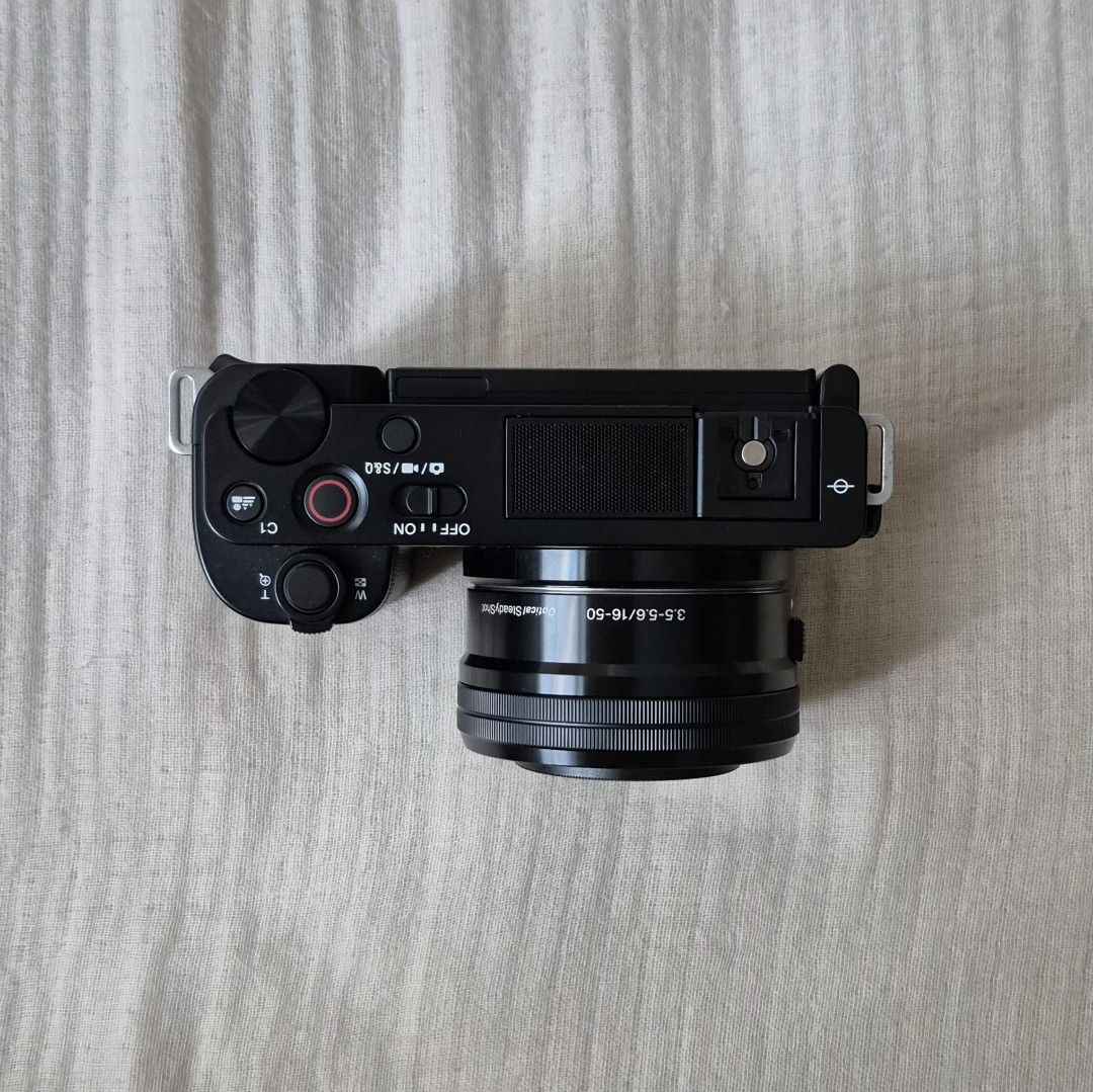 Sony ZV-E10 Mirrorless Camera with 16-50mm Lens (Category: Cameras) located in Quezon City. Submitted by livesunlit (Listing ID 1462111079, Image 3). Description: - Sony ZV-E10 Camera Body - Includes 16-50mm Power Zoom Lens - Comes with 2 Batteries - Includes Charger - Strap included - Lens cap included - screen protector on LCD included - Ideal for Vlogging & Content Creation - Ready to shoot out of the box!.
