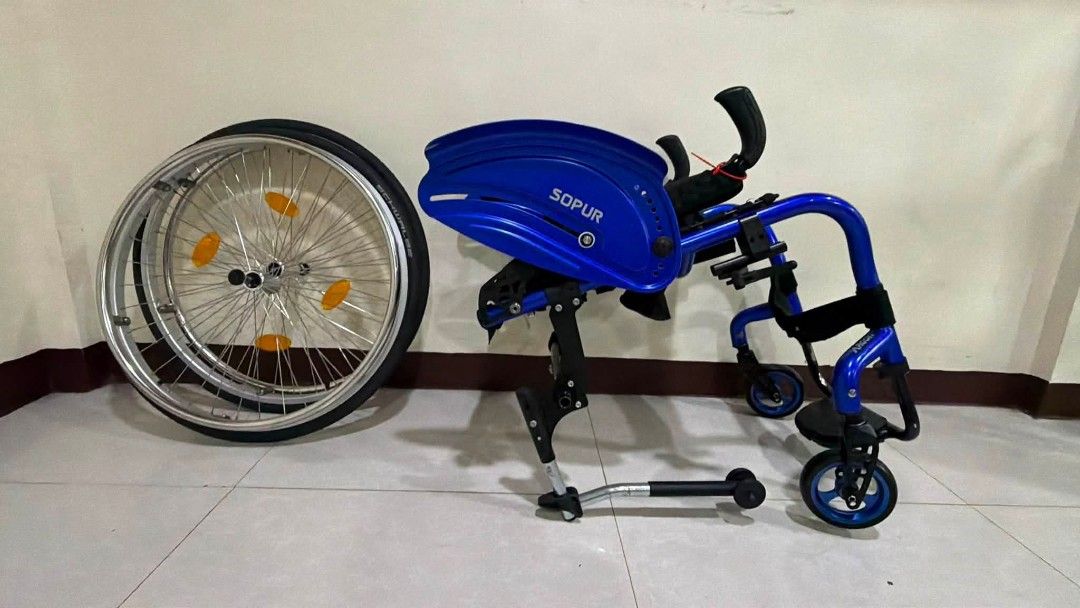 Sopur Blue Lightweight Active Wheelchair (Category: Wheelchairs) located in Manila. Submitted by bravestorm.7b3e5f (Listing ID 1462110005, Image 2). Description: - Lightweight Sopur wheelchair, ideal for active use. - Large rear wheels with handrims for easy self-propulsion. - Smaller front casters for enhanced maneuverability. - Comfortable padded backrest and seat. - Includes a convenient footrest. - Ready for its next owner..