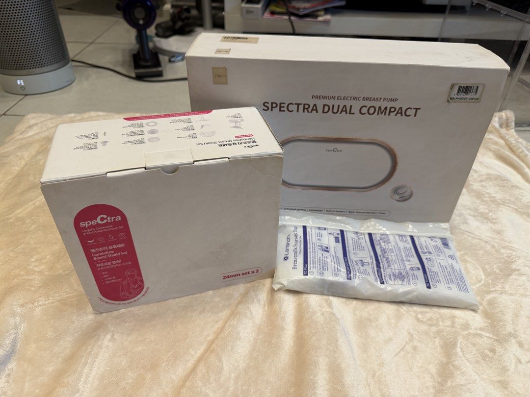 Spectra Dual Compact Premium Electric Breast Pump (Category: Breastfeeding & Bottle Feeding) located in Pasig City. Submitted by erikagill1697-91390 (Listing ID 1462121980, Image 2). Description: - Spectra Dual Compact electric breast pump - Includes main unit, power adapter, tubing, bottles, and breast shields - Comes with an additional Handsfree Spectra breast shield set - All items shown in photos are included - free Lansinoh breastmilk storag