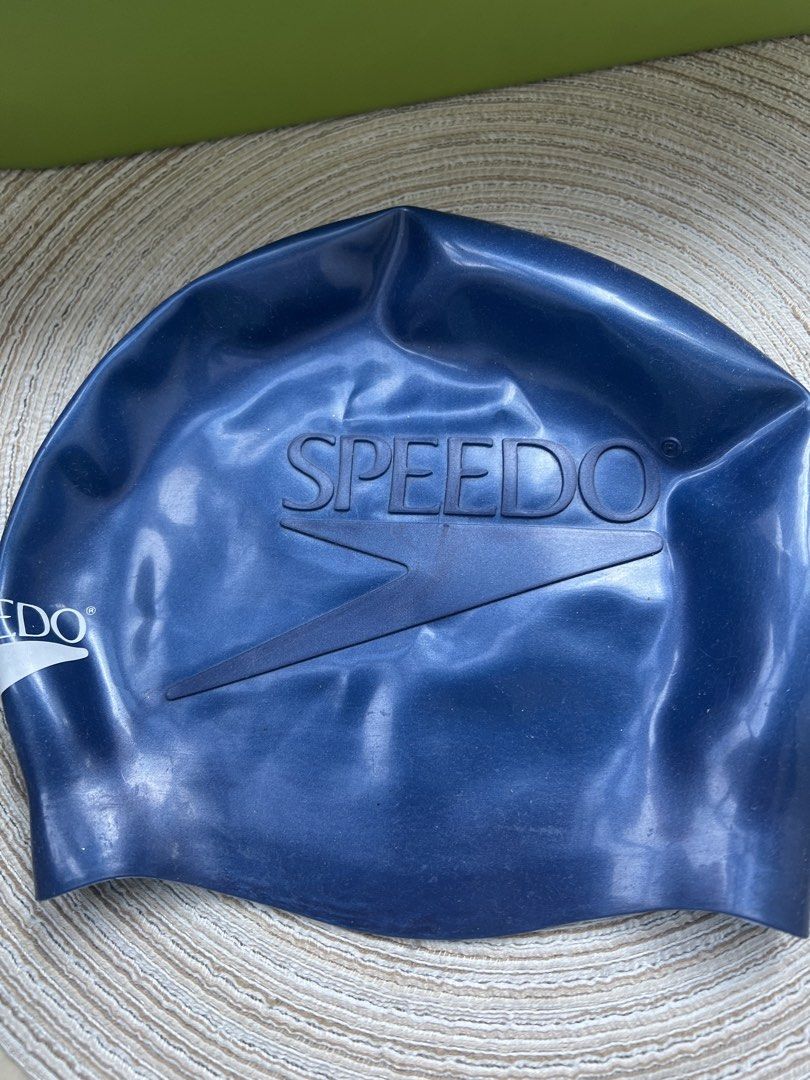 Speedo Navy Blue Silicone Swim Cap (Category: Bikinis & Swimsuits) located in San Juan City. Submitted by iambernie (Listing ID 1462037982, Image 1). Description: - Navy blue Original Speedo swim cap - Made of durable silicone - Classic Speedo logo - Keeps hair out of your face - Comfortable and secure fit - Perfect for your next swim session.