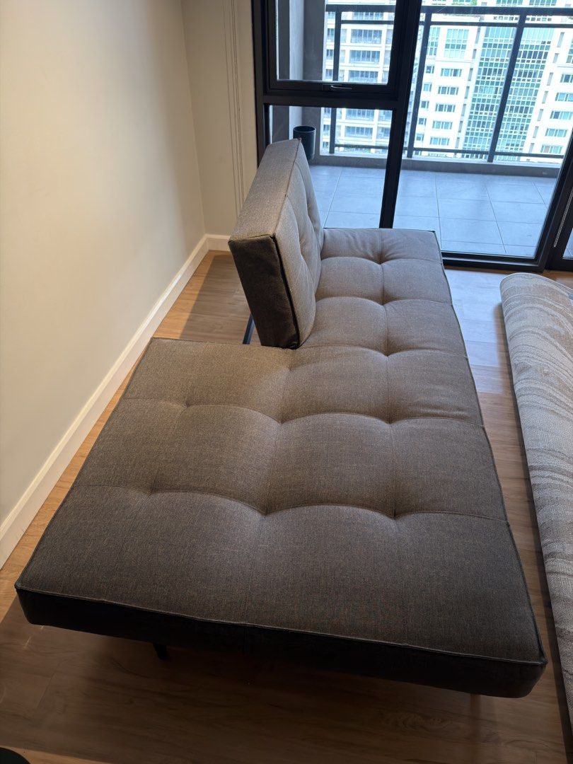 Splitback Sofa Bed Dark Grey - Converts to Flat Bed (Category: Sofas) located in Makati City. Submitted by maiemacale (Listing ID 1462161326, Image 2). Description: - Grey fabric sofa bed - Split back adjustable design - Easily converts into a flat bed - Condition: lightly used, newly shampooed - Dimensions: 208x91x81 cm Original Price: Php62,000 Selling Price: Php40,000.