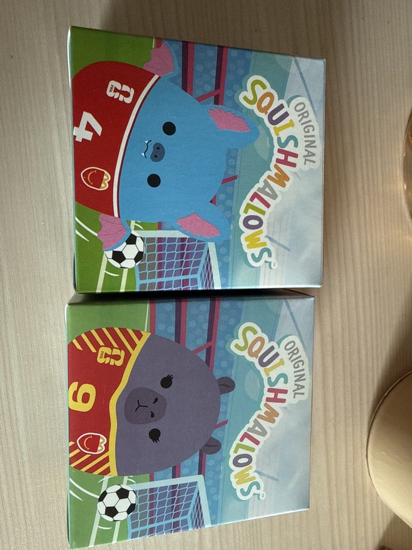 Squishmallows Original Blind Box - Soccer Series (Category: Designer & Blind Box Toys) located in Mandaluyong City. Submitted by merisellsyouwhat (Listing ID 1462066458, Image 1). Description: - Selling 2 original Squishmallow blind boxes. - Both are from the popular soccer series. - One features a blue bat with number 4. - The other has a purple bear with number 9. - Great for Squishmallow collectors or fans! - Grab these rare finds now! 100 ea,