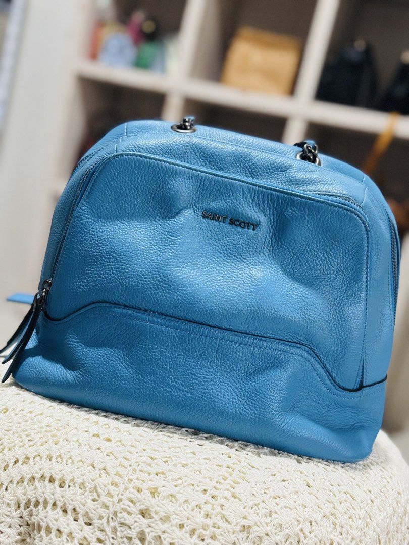 S.S Blue Leather Backpack (Category: Backpacks) located in Bacolod City. Submitted by vintage_vogue6100 (Listing ID 1462139315, Image 1). Description: - Genuine blue leather backpack - Front zip pocket for quick access - Two spacious main zip compartments for organization - Adjustable straps for versatile wear - Can be styled as a backpack or a shoulder bag with chain detail - Ideal size for everyday essentials.