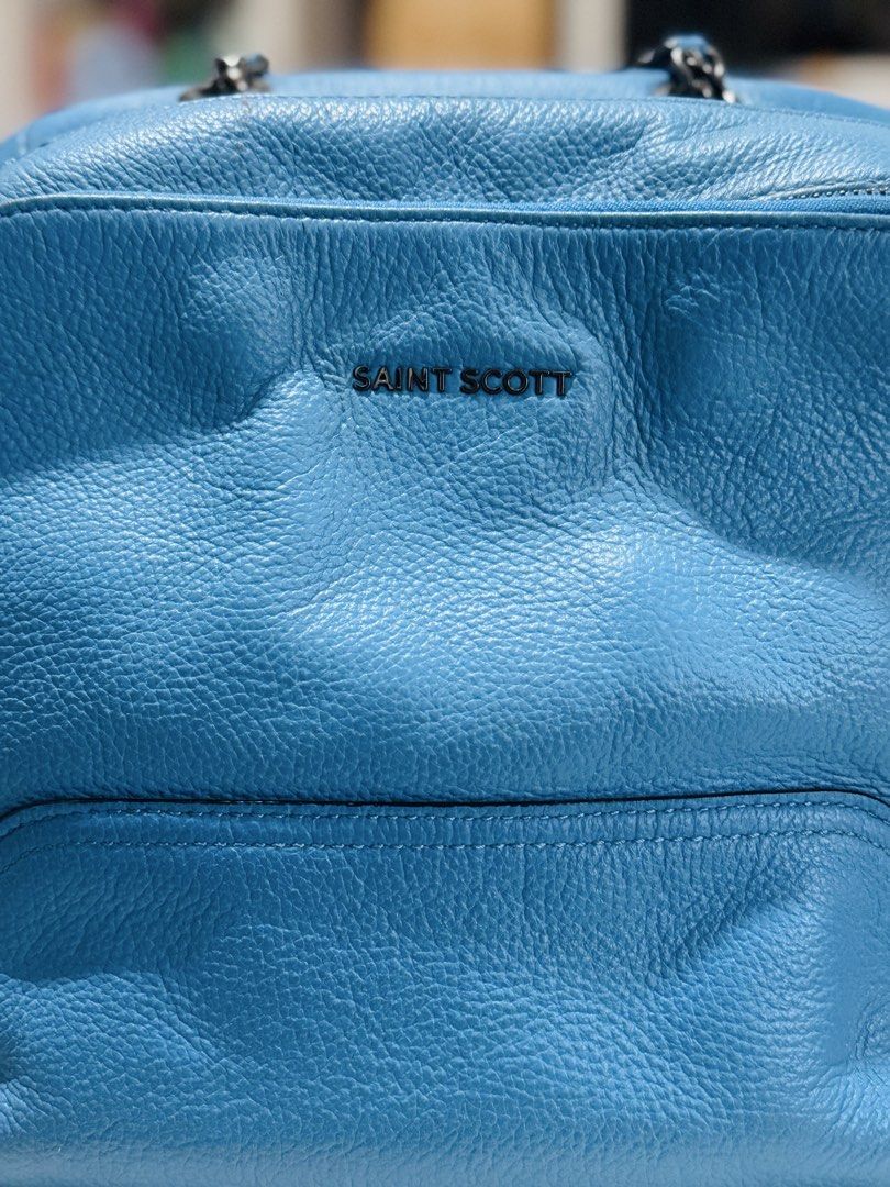 S.S Blue Leather Backpack (Category: Backpacks) located in Bacolod City. Submitted by vintage_vogue6100 (Listing ID 1462139315, Image 2). Description: - Genuine blue leather backpack - Front zip pocket for quick access - Two spacious main zip compartments for organization - Adjustable straps for versatile wear - Can be styled as a backpack or a shoulder bag with chain detail - Ideal size for everyday essentials.