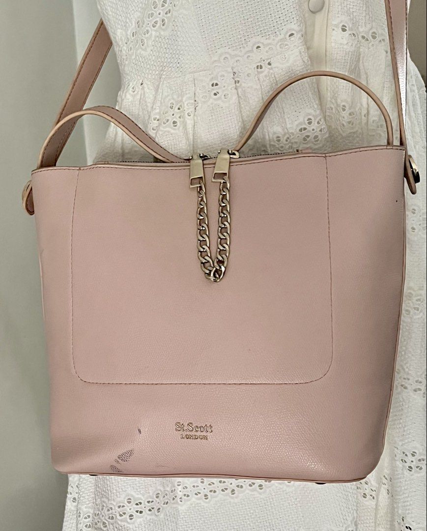 St Scott Sling Bag + White Dress (Category: Cross-body Bags) located in Las Pinas. Submitted by styled_n_preloved (Listing ID 1462141513, Image 2). Description: COMPLETE THE SCHOOL GIRL LOOK, SULIT PRICE for ₱350 only! 💕 > Cute White Dress • Size S but M on tag • above the knee length • Brand : Ienin > Baby pink St Scott London sling bag • Spacious compartment • Rubber lining of the handle needs replacement • slight color transfer (as shown on p