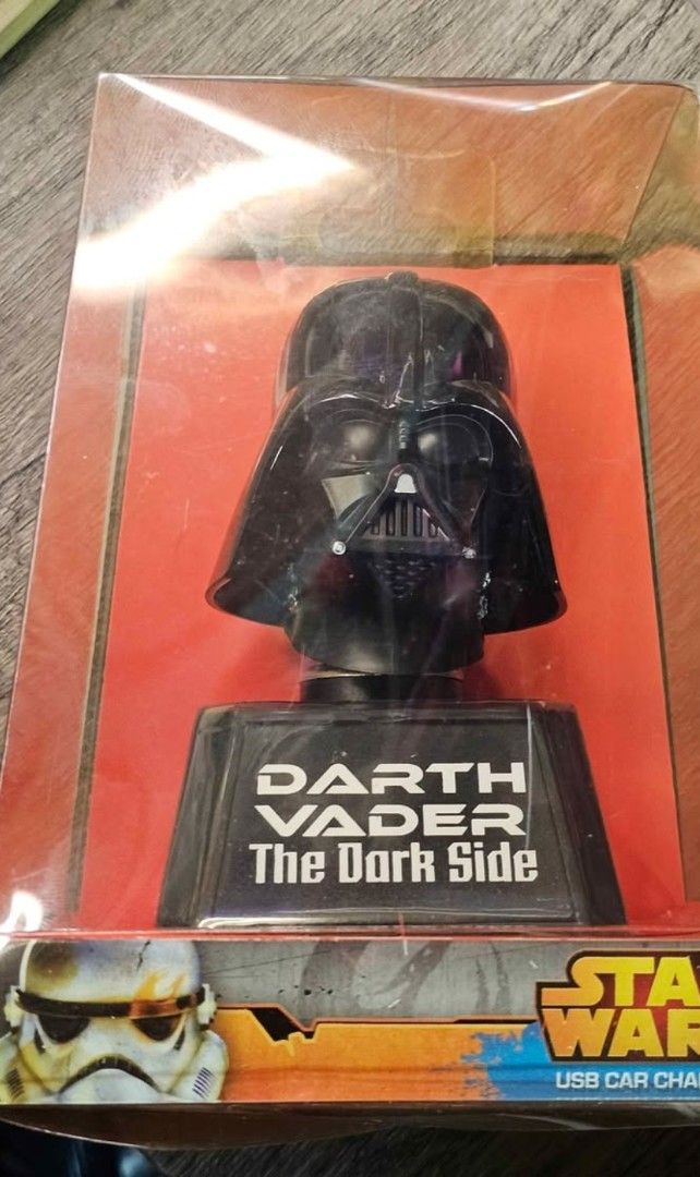 Star Wars Darth Vader USB Car Charger (Category: Western Merchandise) located in Manila. Submitted by jannnoskiii (Listing ID 1462108540, Image 2). Description: - Officially licensed Star Wars Darth Vader car charger. - Plugs into your car's 12V socket. - USB port for charging iPhones, smartphones, iPads, and other devices. - Pivoting arm for adjustable viewing angle. - Perfect for any Star Wars fan on the go..