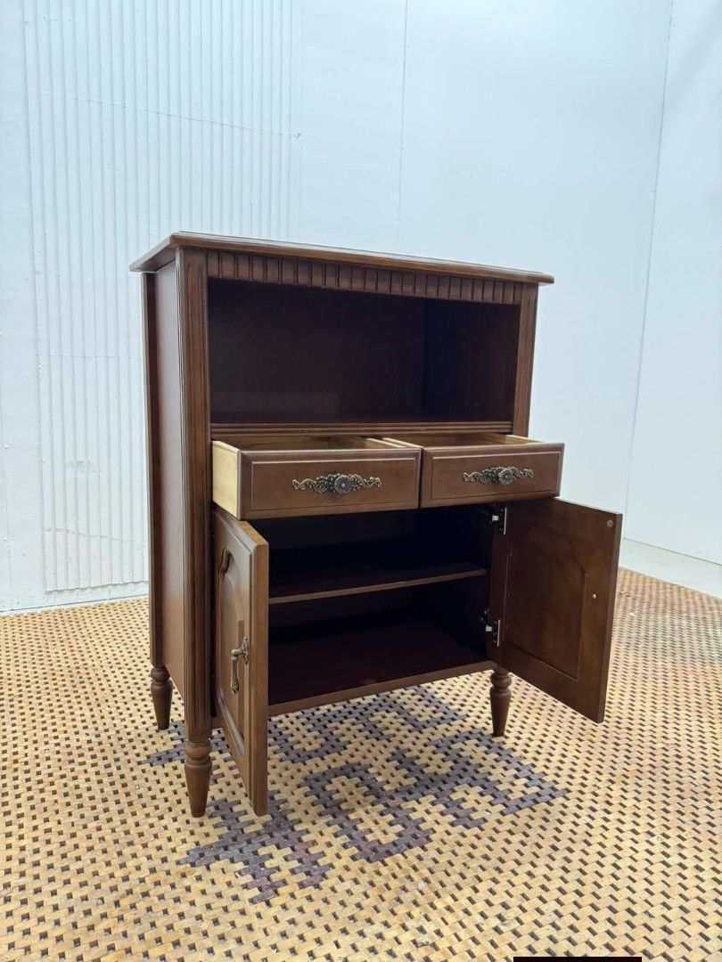 Storage Cabinet (Category: Shelves, Cabinets & Racks) located in Meycauayan. Submitted by marygracecasimiro (Listing ID 1462091814, Image 3). Description: Classic Wooden Storage Cabinet with 2 Drawers & 2 Doors Price: 8,900 L25.5 x W13.5 x H34 In good condition💜💜 The open upper shelf makes it especially suitable as a display/storage cabinet, buffet cabinet, or living-room storage cabinet..
