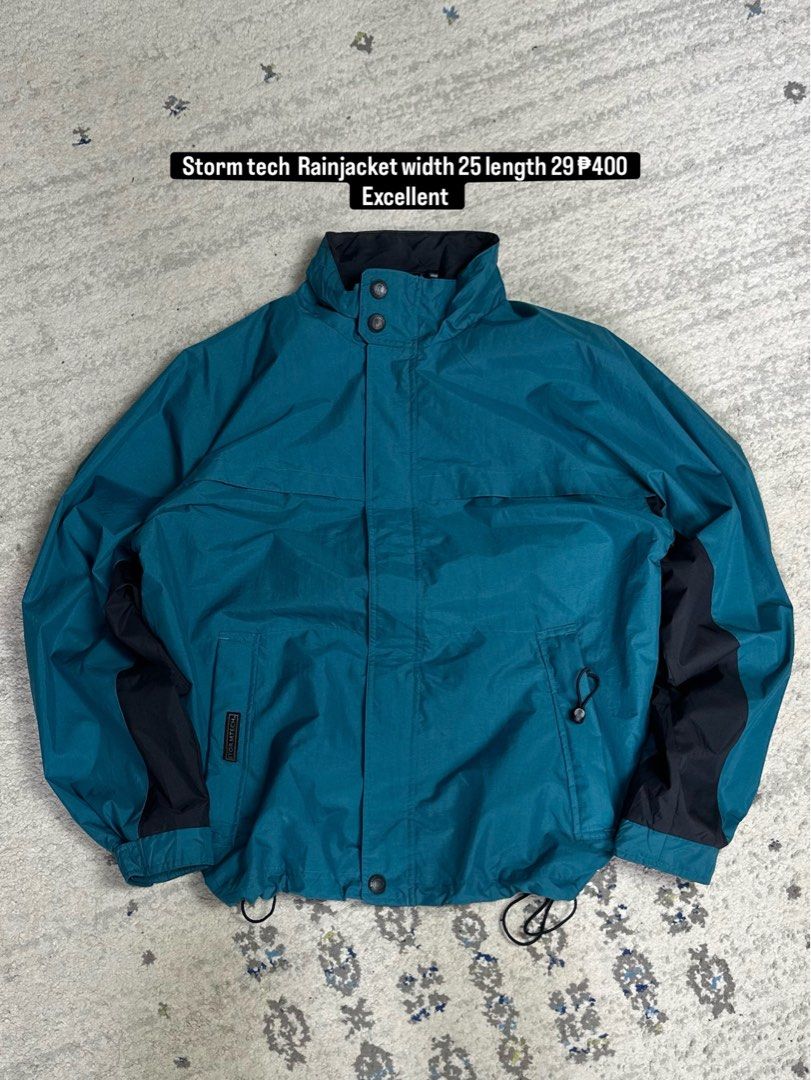 Storm Tech Rainjacket Teal/Black L (Category: Coats, Jackets and Outerwear) located in Daet. Submitted by thrifthings2018 (Listing ID 1462116606, Image 1). Description: - Storm Tech Teal & Black Rainjacket - Size: Large (L) - Measurements: Width 25 inches, Length 29 inches - Features adjustable drawstring at the hem - Ideal for rainy weather.