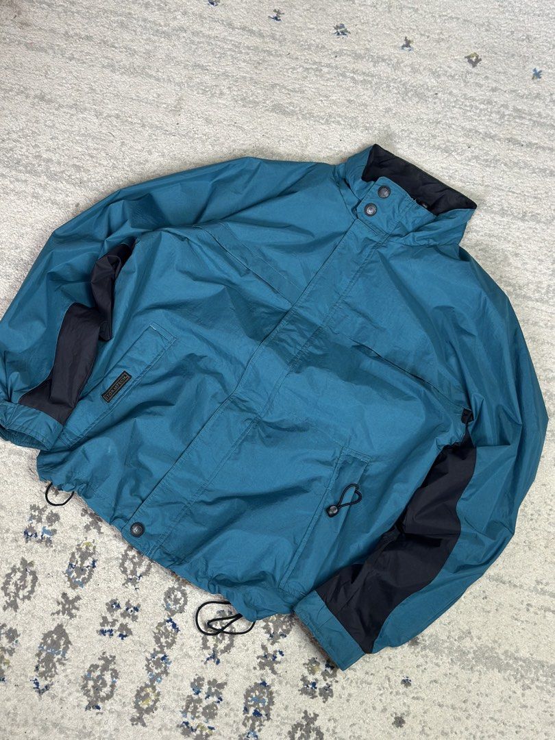 Storm Tech Rainjacket Teal/Black L (Category: Coats, Jackets and Outerwear) located in Daet. Submitted by thrifthings2018 (Listing ID 1462116606, Image 2). Description: - Storm Tech Teal & Black Rainjacket - Size: Large (L) - Measurements: Width 25 inches, Length 29 inches - Features adjustable drawstring at the hem - Ideal for rainy weather.