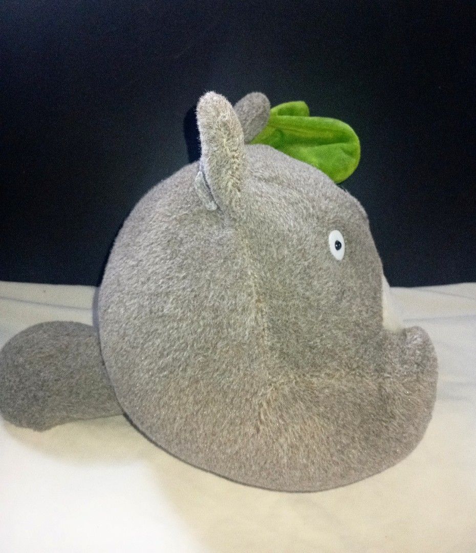 Studio Ghibli Totoro Big Plushie (Category: Plushies & Soft Toys) located in Tarlac. Submitted by kaizer_rabbit (Listing ID 1462078435, Image 2). Description: Studio Ghibli Totoro with Leaf beanbag plush. It features soft grey fabric, belly stitched markings, and a weighted pellet base to sit upright. 🍃 perfect gift for studio ghibli lovers 🎁 dm me for more pics, info and inquiries :>.