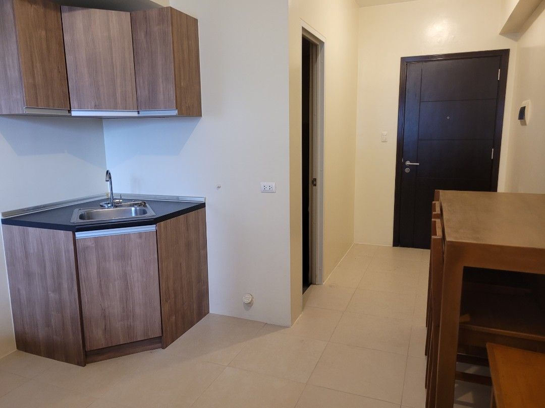 Studio Unit for Lease (Category: Apartments & Condos) located in Quezon City. Submitted by iamkooldude (Listing ID 1462040199, Image 1). Description: Semi-furnished Studio Unit for lease with bedframes and mattress, closet, cabinet and dining set, 1 yr lease P18T/mo inclusive of association dues 1 month advance 2 months deposit with PDCs for the 11 remaining months will be available by Nov. 4, 2026.