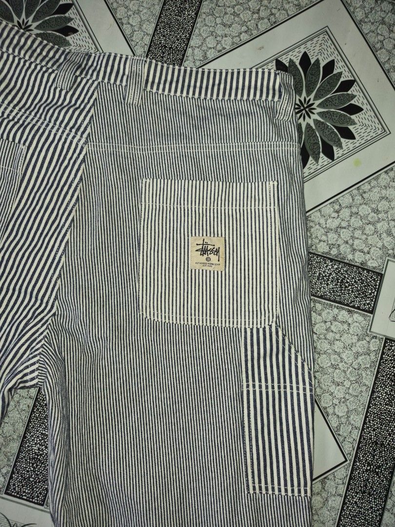 Stussy Patchwork Striped Carpenter Pants (Category: Jeans) located in Ilagan. Submitted by culalabejen05 (Listing ID 1462125965, Image 3). Description: - Stussy Carpenter Pants - Unique patchwork design - Classic navy and white pinstripe pattern - Multiple practical pockets - Relaxed fit for everyday comfort - Size: 32 Best fit 34 - Made in China.