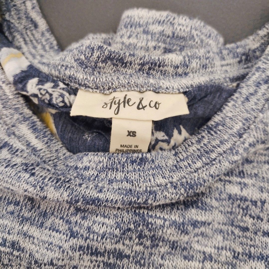 Style & Co. Blue Melange Long-Sleeve Layered Top (Category: Longsleeves) located in Subic. Submitted by mustardt_ (Listing ID 1462079751, Image 3). Description: A heather blue/grey marled knit long-sleeve top featuring a peek-a-boo dark floral accent layer at the bottom hem and a matching floral panel button-down detail down the back. size: 19in x 22.5in code: c740.