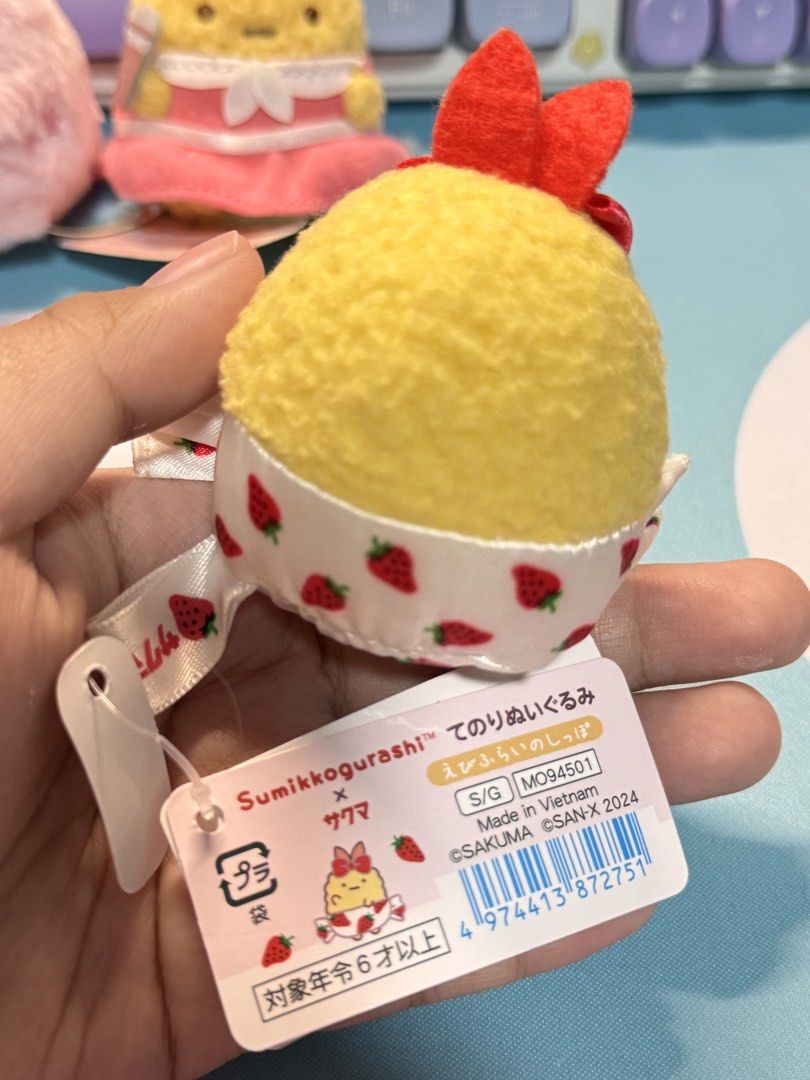 Sumikko Gurashi Strawberry Plush Toy Ebi (Category: Plushies & Soft Toys) located in Caloocan City. Submitted by heeynahsbliss (Listing ID 1462061536, Image 2). Description: - Adorable Sumikko Gurashi plush toy - Features a cute strawberry pattern on its outfit - Comes with original tags attached - Perfect for collectors and fans of the series - Small and portable size, great for display or travel.