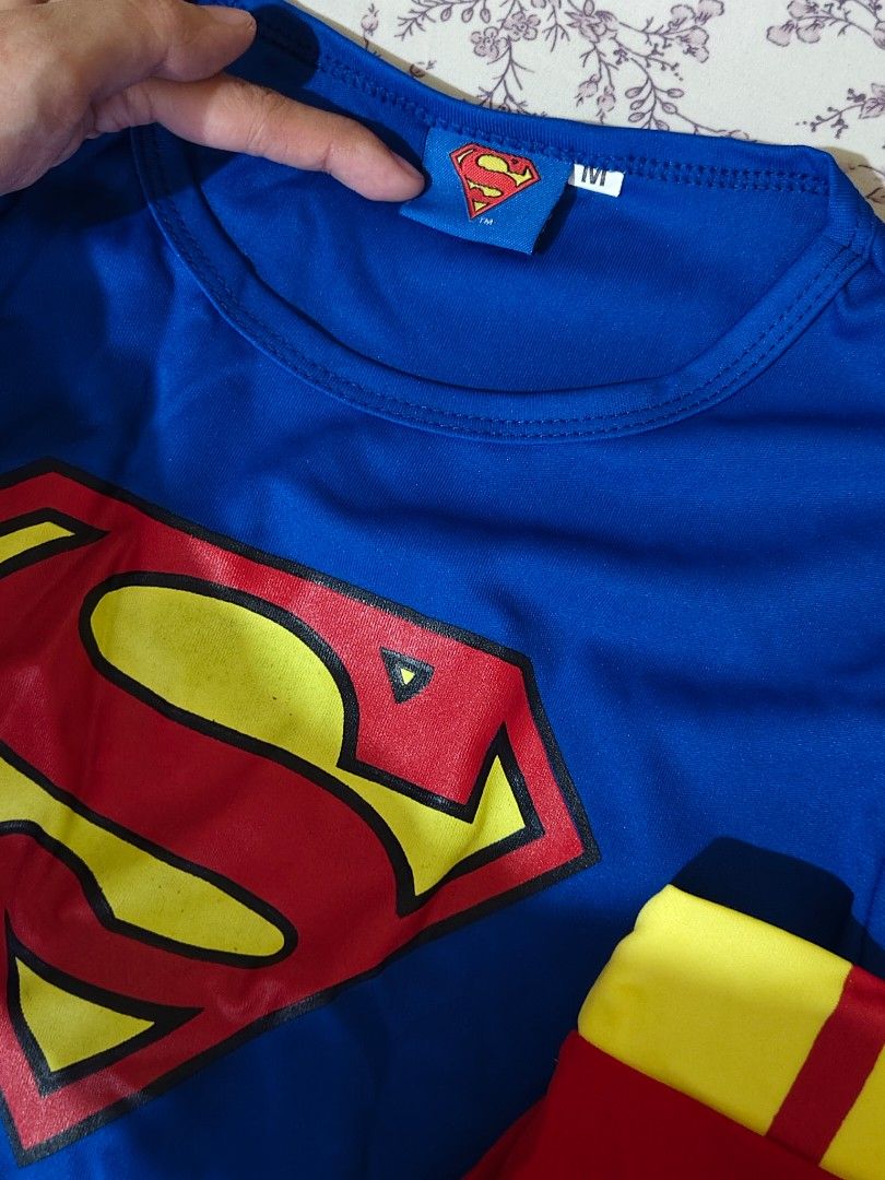 Superman costume blue and red set (Category: Babies & Kids Fashion) located in Bulacan. Submitted by angel.decluttersx (Listing ID 1462080719, Image 2). Description: medium size on white tag no issue brand new original includes: long-sleeved shirt with the classic "S" shield logo matching pants, and a separate red cape.