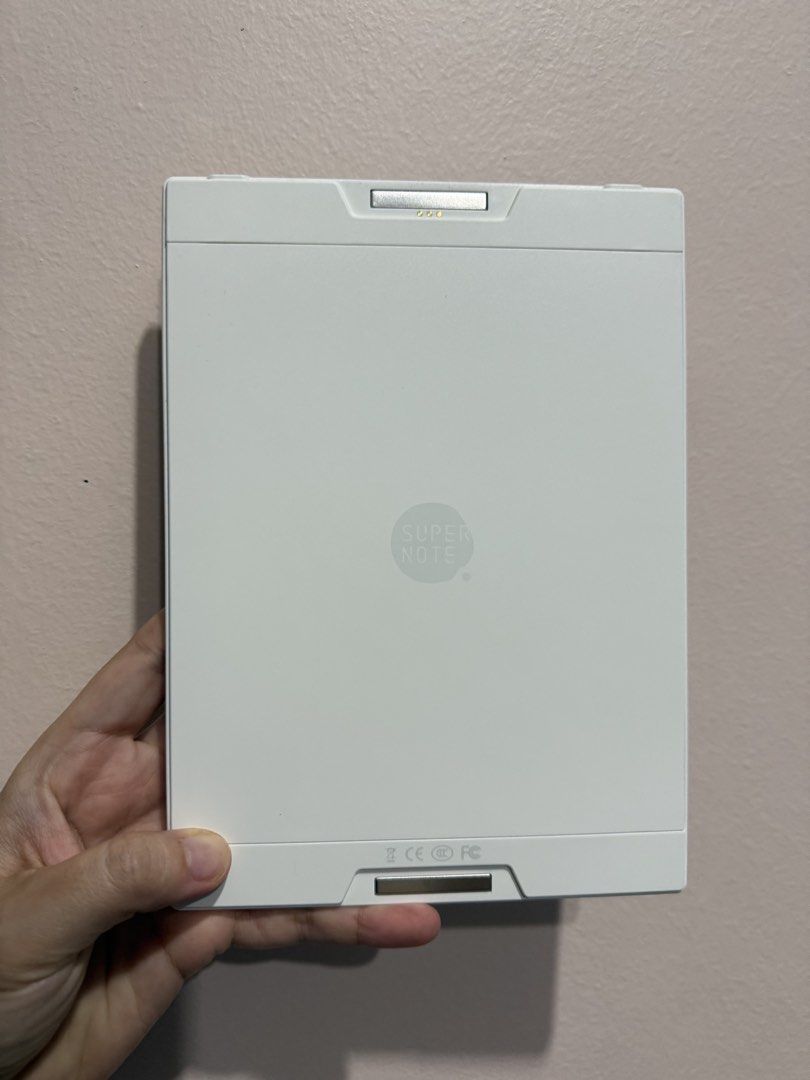 Supernote Digital Notebook E-reader with Case (Category: E-Readers) located in Singapore. Submitted by maxxiieeeebui (Listing ID 1462166939, Image 2). Description: - Supernote digital notebook - Includes grey fabric case - Perfect for note-taking and reading - USB-C charging port - Simple, functional, and easy to use design Screen Display Type 7.8” Glass EPD (ePaper display) Resolution 300 PPI (1404 x 1872) Film Show more information FeelWrite 2 