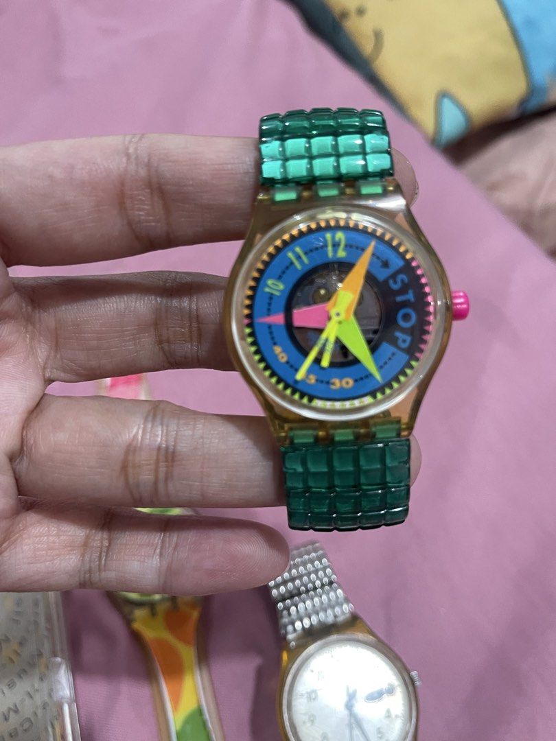 Swatch watches take all as is (Category: Women's Watches) located in Cabiao. Submitted by imeon13 (Listing ID 1462164396, Image 2). Description: take all 1.ung bak2x na strap working po dikit nyu lang ung nabakbak sa strap 2.ung green kapag inikot sa crown nya hndi gumagalaw ung hands 3.ung silver hndi naiikot ung crown.