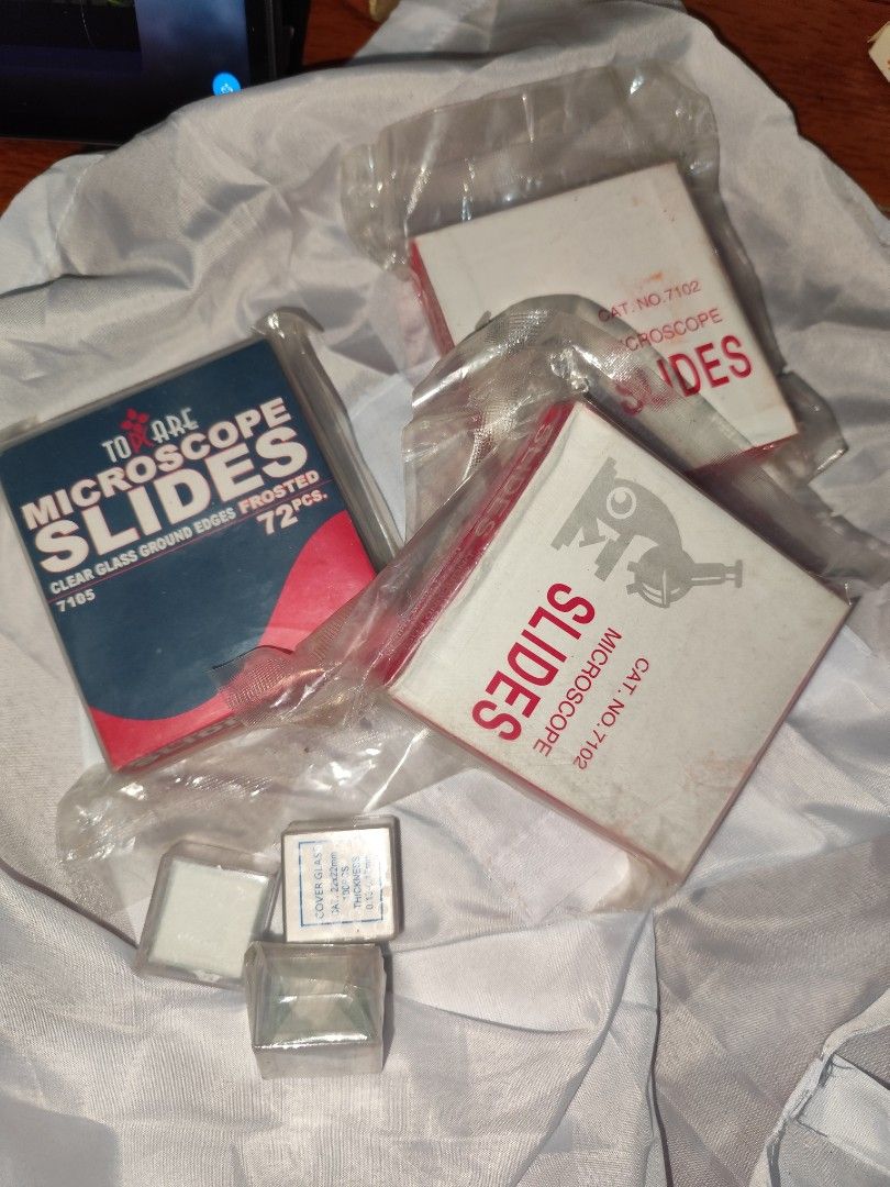 TAKE ALL 180 - Microscope Slides & Cover Glass (Category: Medical Supplies & Tools) located in Taguig. Submitted by chaitosss (Listing ID 1462124299, Image 1). Description: - Brand new, sealed Tomarc microscope slides (72 frosted, model 7105) - Includes a box of 22x22mm cover glass (0.13-0.17mm thickness) - Additional box of Tomarc microscope slides (model 7102) included - All items are factory sealed in plastic packaging - Ideal for science expe