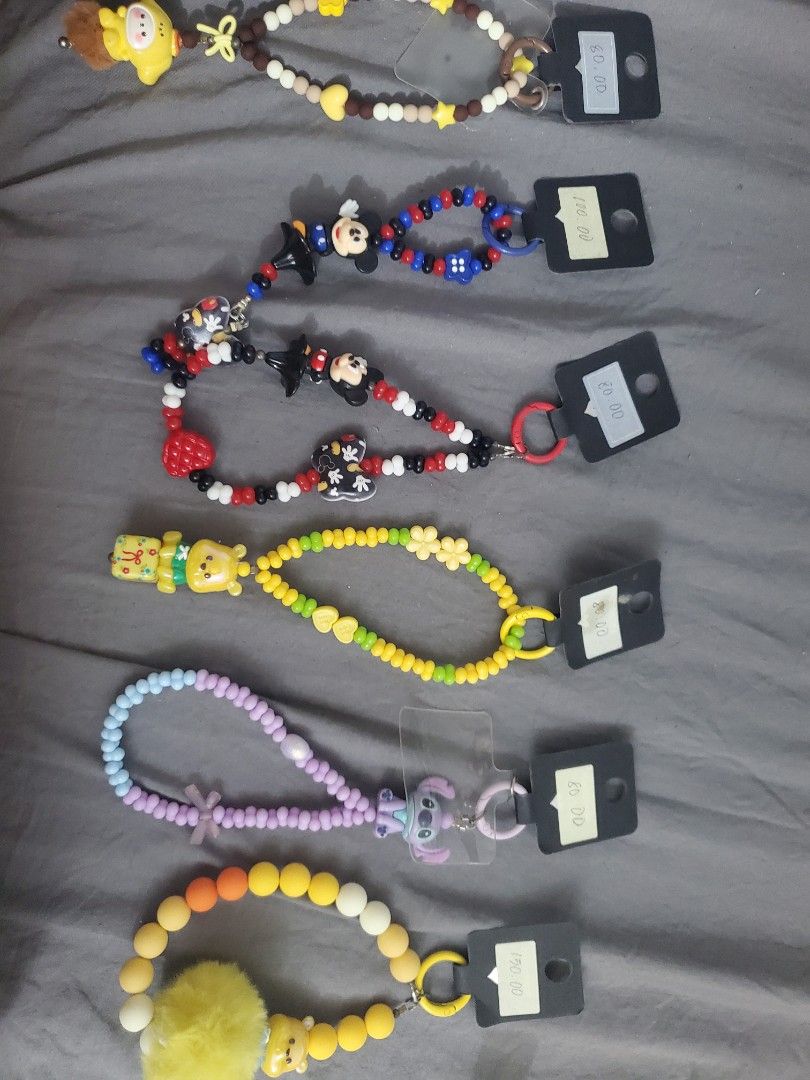 [TAKE ALL!] Handmade Phone Charms (Category: Handmade Craft) located in Malolos. Submitted by rinkoshrimps (Listing ID 1462165570, Image 1). Description: Charms by Demcil offers handmade phone charms, bag charms, and crafts made with quality and durability in mind. Each charm is made using metal wire, which is sturdier and longer-lasting compared to the wire typically used in regular charms. Designs are unique and handmade. Made-to-Order items ar