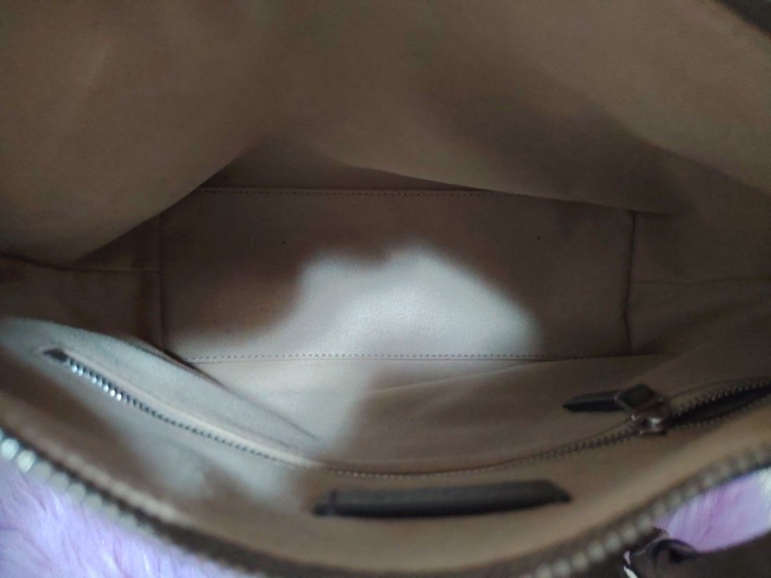 Taupe Leather Crossbody Bag with Adjustable Strap (Category: Cross-body Bags) located in Valenzuela. Submitted by glitter_preloved (Listing ID 1462124244, Image 3). Description: - Chic taupe crossbody bag - Genuine pebbled leather - Spacious main compartment with secure zip closure - Comfortable, adjustable fabric strap - Ideal for daily use - Clean interior.