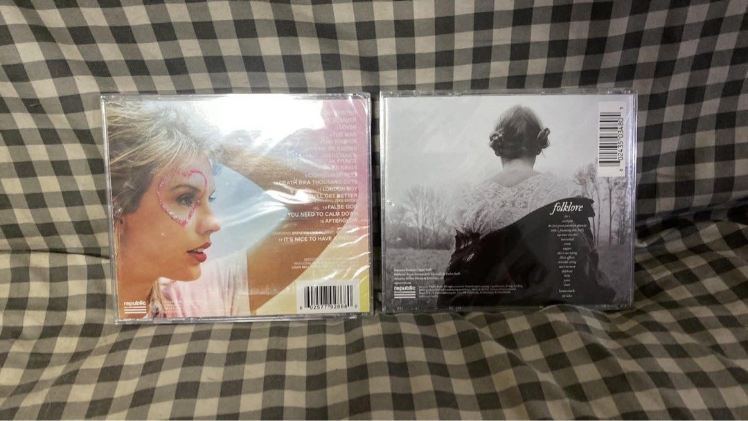 Taylor Swift Lover and Folklore CDs (Category: CDs & DVDs) located in Pasig City. Submitted by pollyyesterr (Listing ID 1462197463, Image 2). Description: - Brand new Taylor Swift CDs: Lover & Folklore - Both albums are still in original plastic wrap - Lover features the hit song 'You Need To Calm Down' - Folklore includes the popular track 'Cardigan' - Must-have additions for any Taylor Swift fan's collection - Get both albums together!.