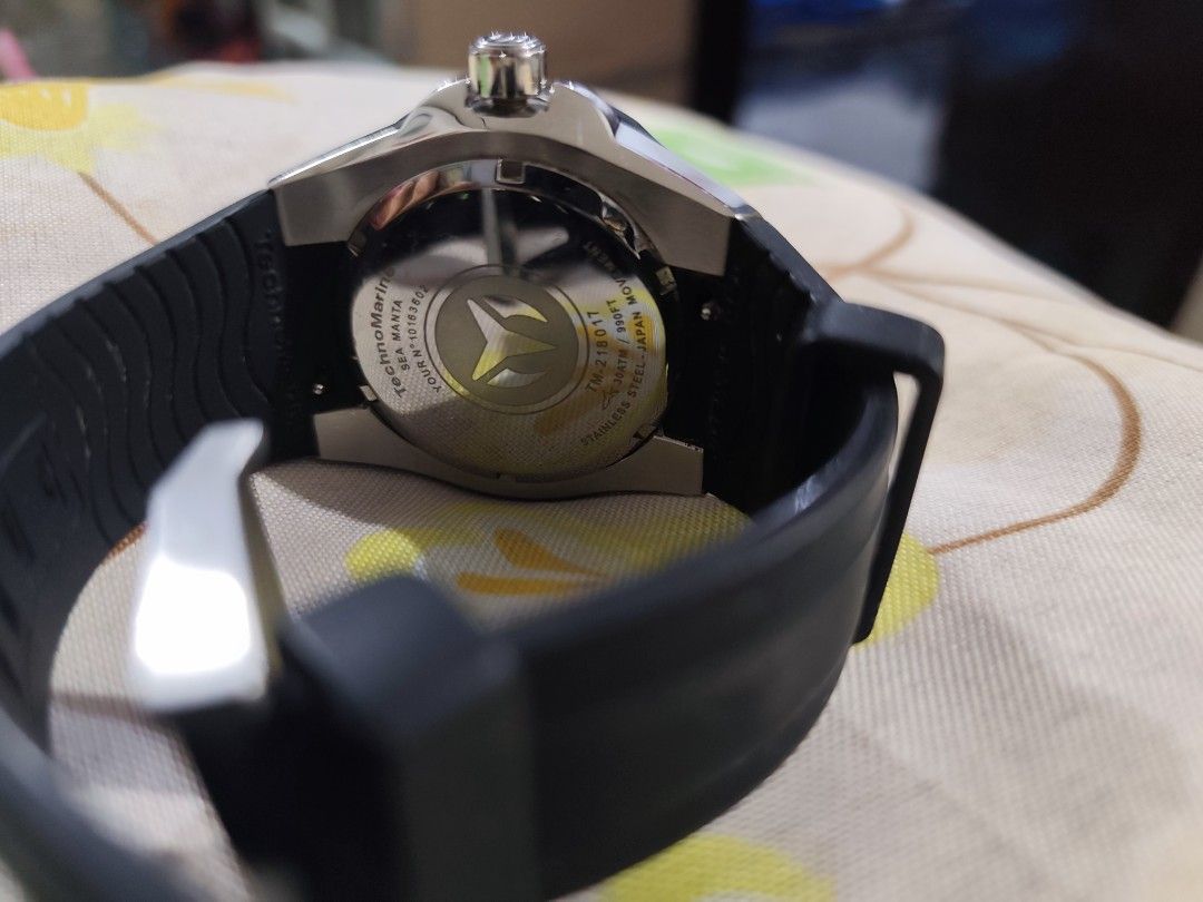 TechnoMarine Manta Watch (Category: Luxury Watches) located in Manila. Submitted by gelvy1316 (Listing ID 1462155187, Image 2). Description: - TechnoMarine Manta Watch - Black rubber strap - Silver and gold bezel - Date window at 3 o'clock - Water resistant - Ideal for diving and everyday wear - Selling as is.