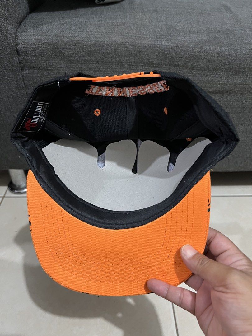 Tennessee Snapback Cap Orange Black Bull Boy (Category: Caps & Hats) located in Mandaluyong City. Submitted by luna_elisse (Listing ID 1462050867, Image 2). Description: - Orange and black snapback cap - 'Tennessee' embroidered on front and back - Repeating 'Tennessee' and 'T' pattern on brim - Adjustable snapback closure - Bull Boy brand tag inside -Price:850 +sf -MOP: Gcash/BDO/Gotyme -RFS: decluttering.