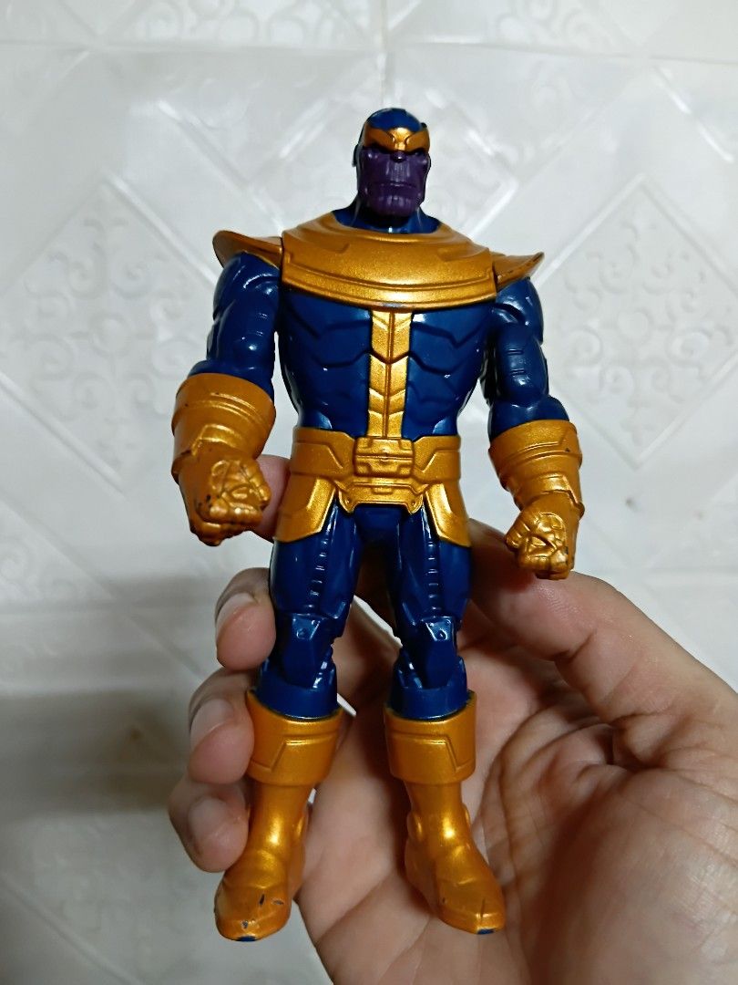 Thanos Basic Action Figure Hasbro (Category: Figurines & Statues) located in Quezon City. Submitted by coffeeyuki56158 (Listing ID 1462061908, Image 1). Description: authentic hasbro brand toy thanos action figure , in very presentable condition , good for marvel collectors qc areas meet ups.