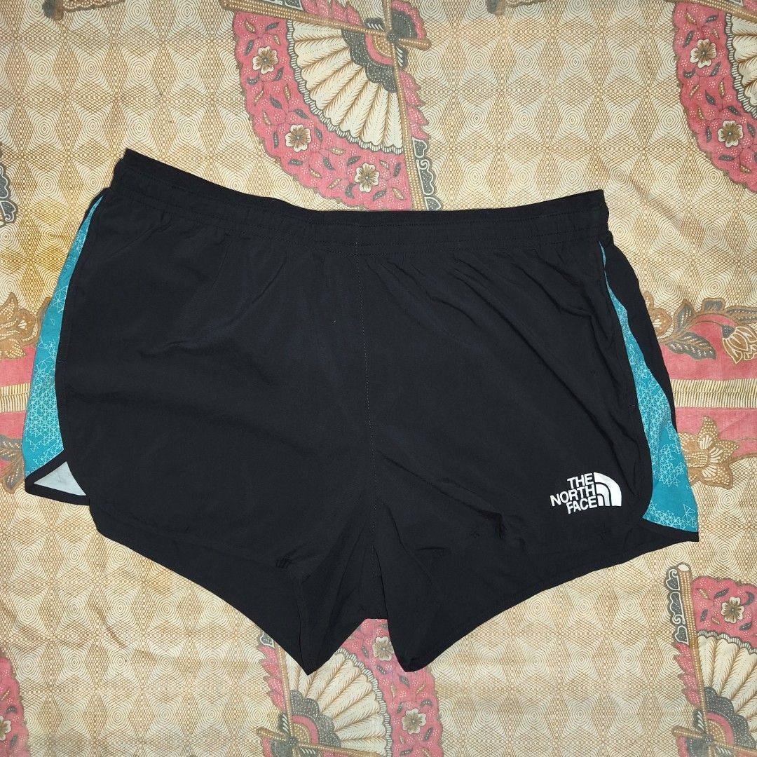 The North Face Flight Series Running Shorts (Category: Shorts) located in Antipolo. Submitted by alphaomega_fox (Listing ID 1462038496, Image 1). Description: - Brand: The North Face - Color: Black with teal side accents - Features: Small back zip pocket, elasticated waist with drawstring - Material: Lightweight and breathable - Ideal for: Running, track, trails cut tags and no inner panty 28-34x10 250 plus sf.