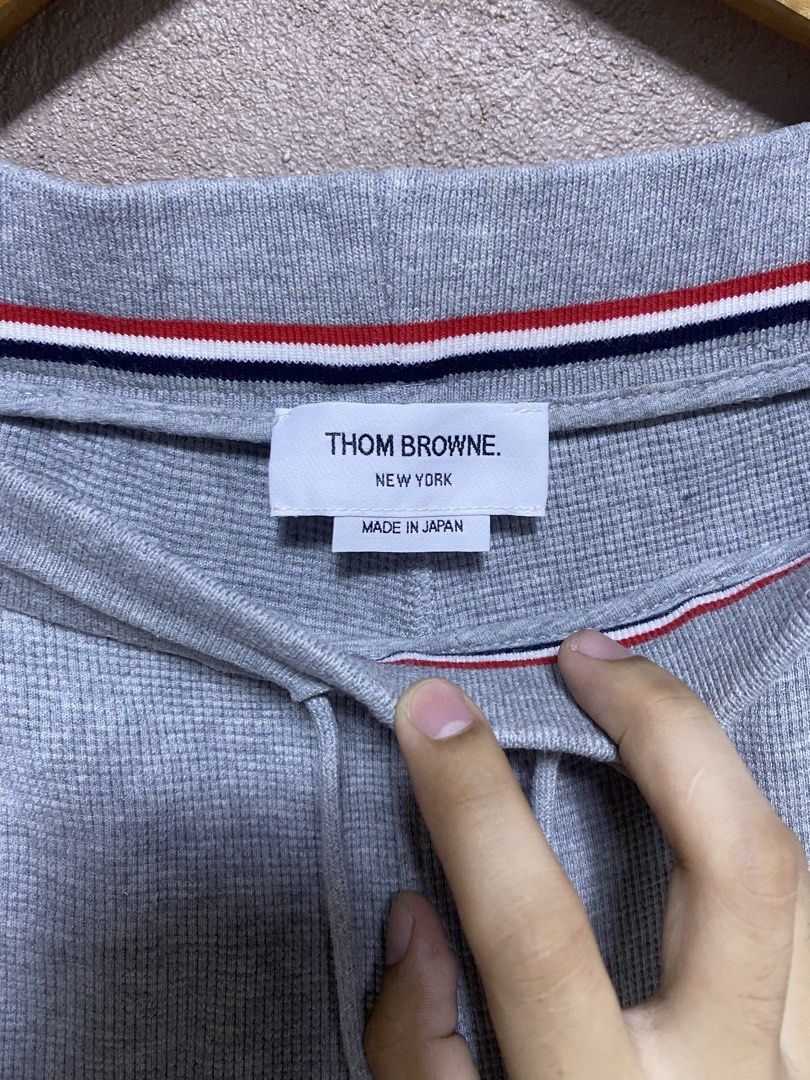 Thom Browne (Category: Luxury Apparel) located in Iloilo. Submitted by prelovedfindsilo (Listing ID 1462156088, Image 3). Description: TBrowne Sweatpants Size: Waistline 30-34 Length 39.5 Excellent condition Needwash .