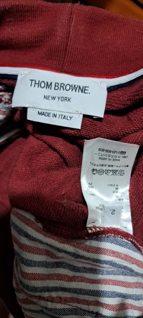 Thom Browne Red Sweat Shorts Size 2 (Category: Shorts) located in San Fernando, Camarines Sur. Submitted by ladderaya (Listing ID 1462145589, Image 2). Description: - Brand: Thom Browne - Color: Red - Size: 2 - Material: Sweatshorts - Origin: Made in Italy - Features: Drawstring waist, white side stripes - Style: Casual wear.