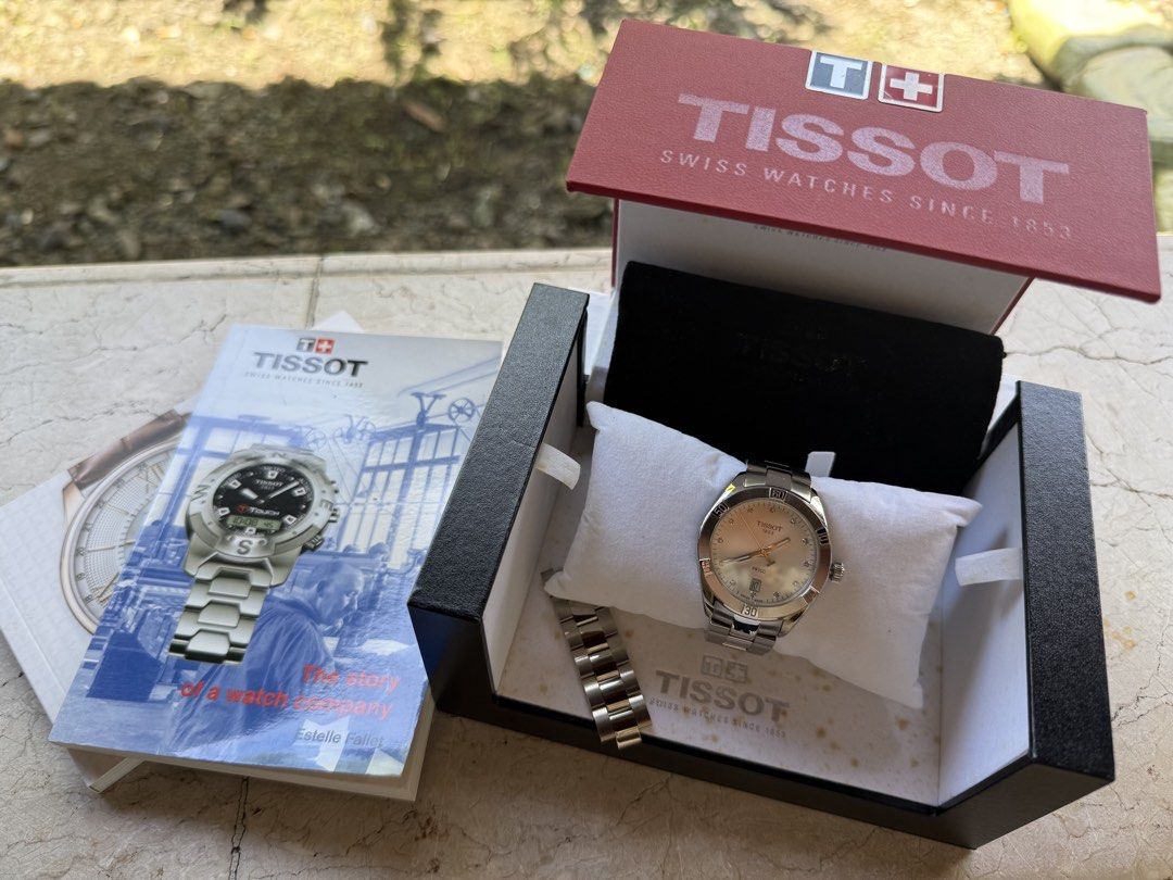 Tissot T101910 A Quartz Watch (Category: Luxury Watches) located in Manila. Submitted by laravidal (Listing ID 1462158063, Image 1). Description: - Tissot PR100 Quartz Watch - Silver stainless steel bracelet - Light-colored dial - Includes original box - Extra links included - Ideal for everyday wear.