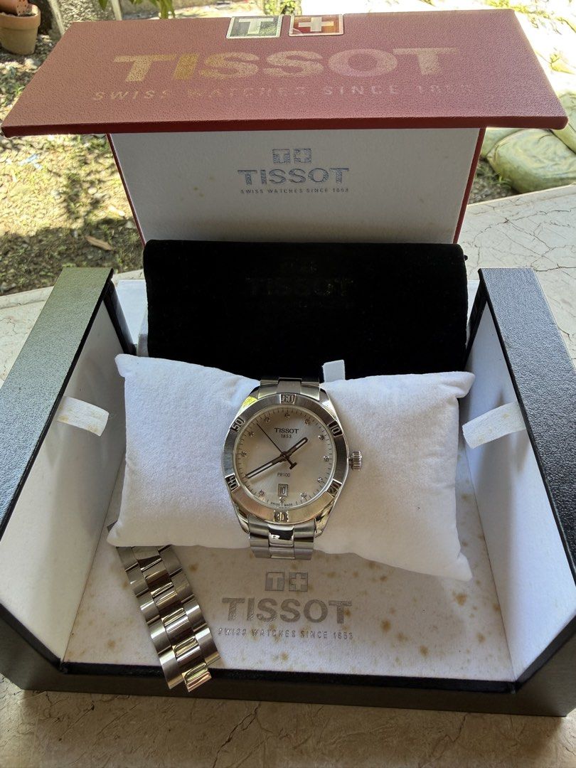 Tissot T101910 A Quartz Watch (Category: Luxury Watches) located in Manila. Submitted by laravidal (Listing ID 1462158063, Image 2). Description: - Tissot PR100 Quartz Watch - Silver stainless steel bracelet - Light-colored dial - Includes original box - Extra links included - Ideal for everyday wear.