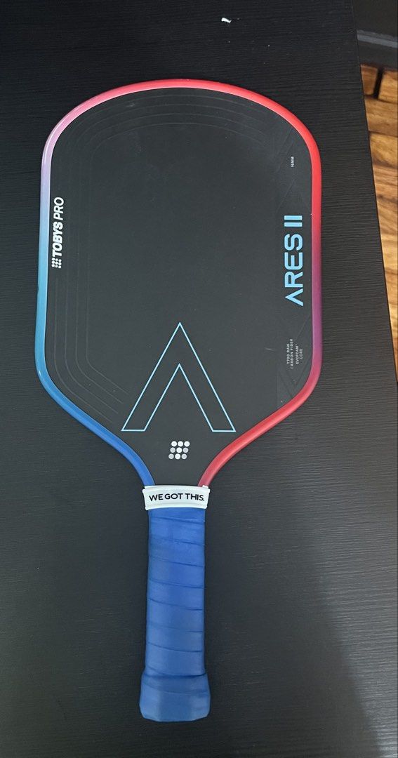 Toby's Pro Ares II Pickleball Paddle (Category: Racket and Ball Sports) located in Pasig City. Submitted by bbt07 (Listing ID 1462054199, Image 2). Description: - Toby's Pro Ares II pickleball paddle - Carbon fiber surface for powerful shots - Honeycomb core for excellent control - Features a motivational 'We Got This' grip - Perfect for your next pickleball match.
