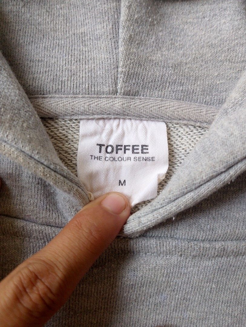 TOFFEE Grey Hoodie Size M (Category: Hoodies) located in Caloocan City. Submitted by sharpthreads18 (Listing ID 1462074475, Image 3). Description: Toffee Gray Hoodie ‎________________ ‎📏DIMES (INCHES) ‎Length: 24 ‎Width: 24 ‎________________ ‎🧷DETAILS ‎Issue: none ‎Condition: Excellent ‎Color rate: 10/10.
