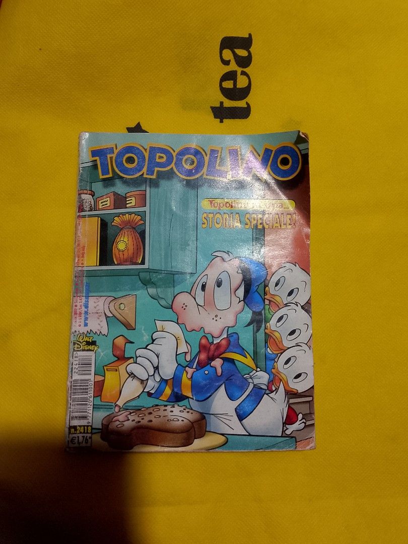 Topolino Magazine - Disney Comic Book (Category: Comics & Manga) located in Manila. Submitted by sheshe.888 (Listing ID 1462187036, Image 1). Description: - Vintage Topolino magazine from Disney - Features Donald Duck and nephews - Ideal for collectors and classic Disney comic fans - Shows some wear on cover and pages, consistent with age - Includes special stories for a fun read.